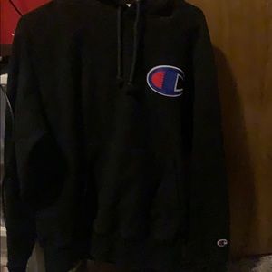 A black champion hoodie
